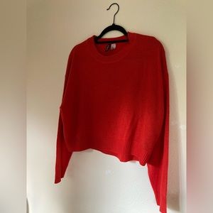Red slightly cropped sweater